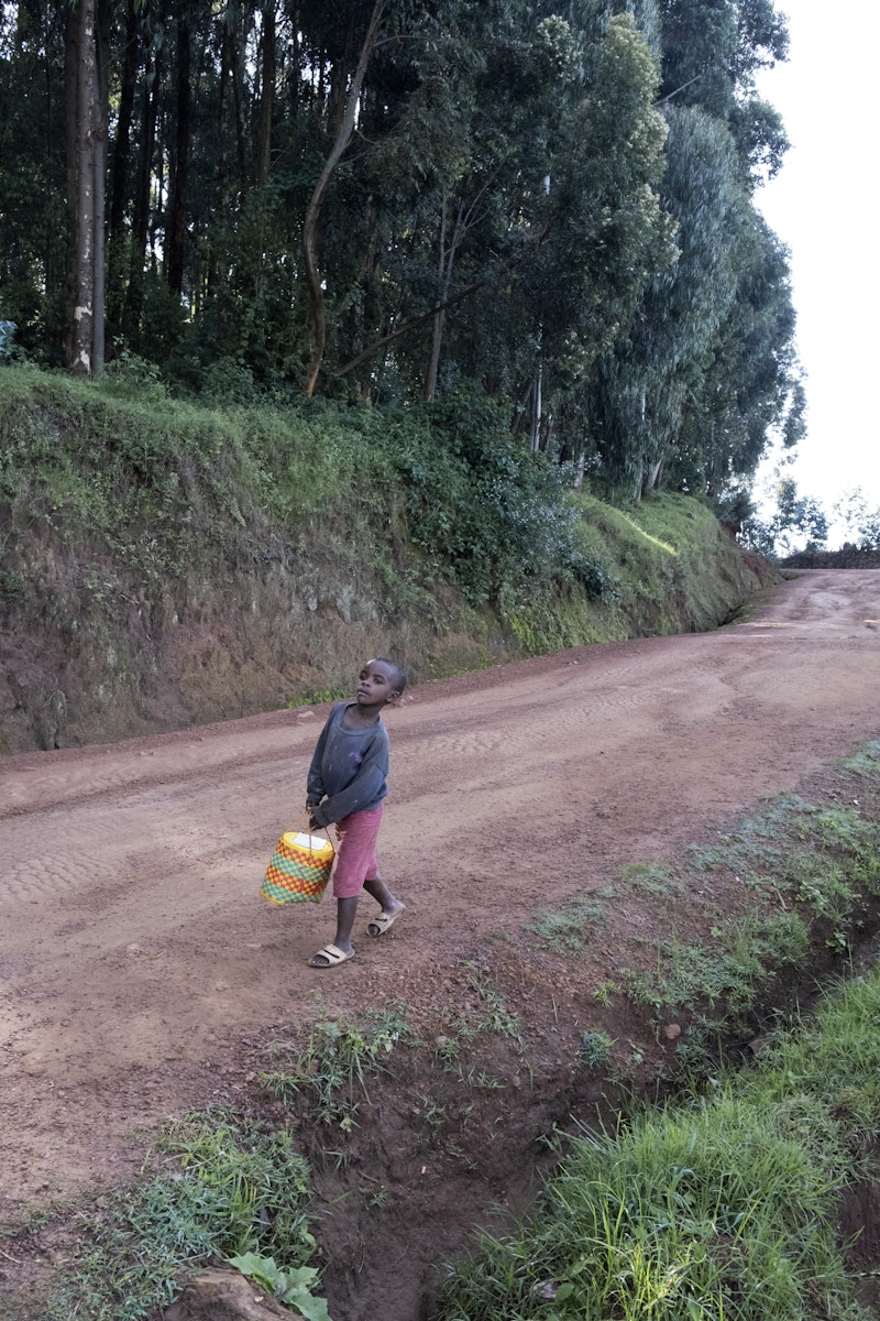 A child carrying a bag