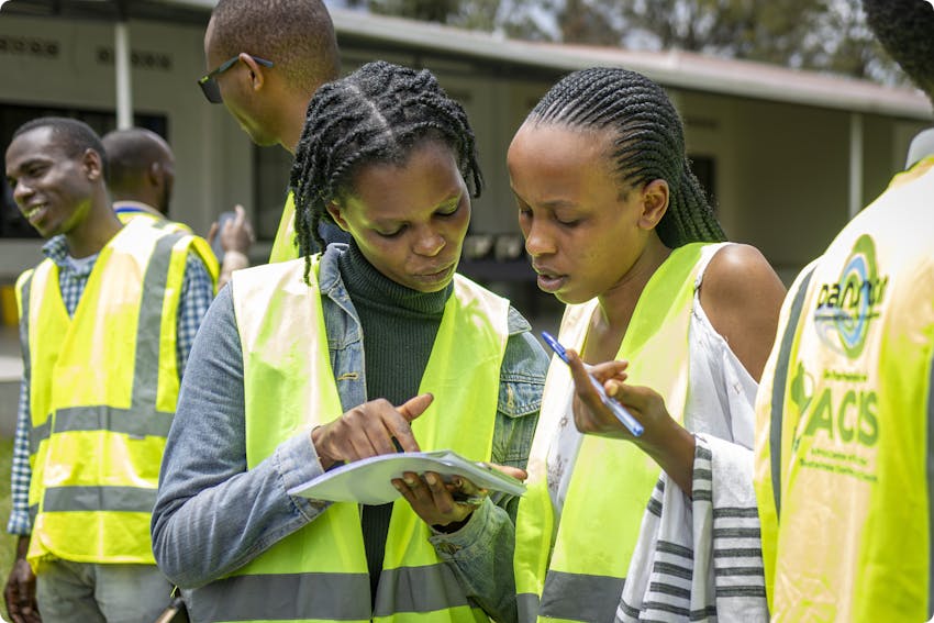 Two students discuss their work.