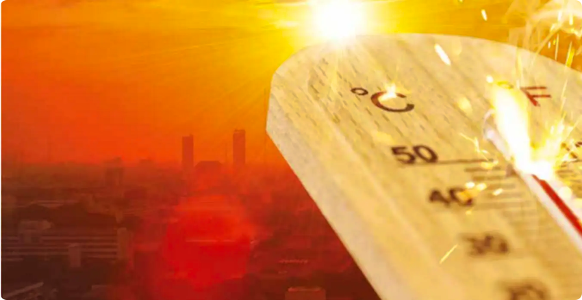 A thermometer in front of a city overheating under the hot sun