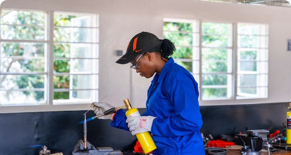 Student learning brazing techniques